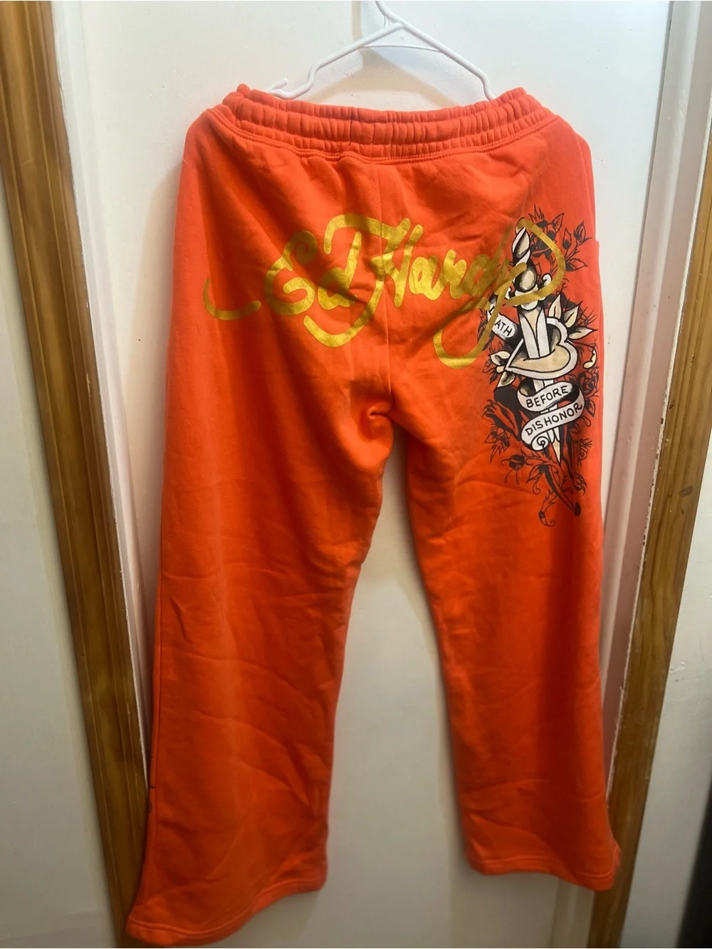 This Vibrant Orange Ed Hardy Drawstring Sweat Pant is Available 🧡